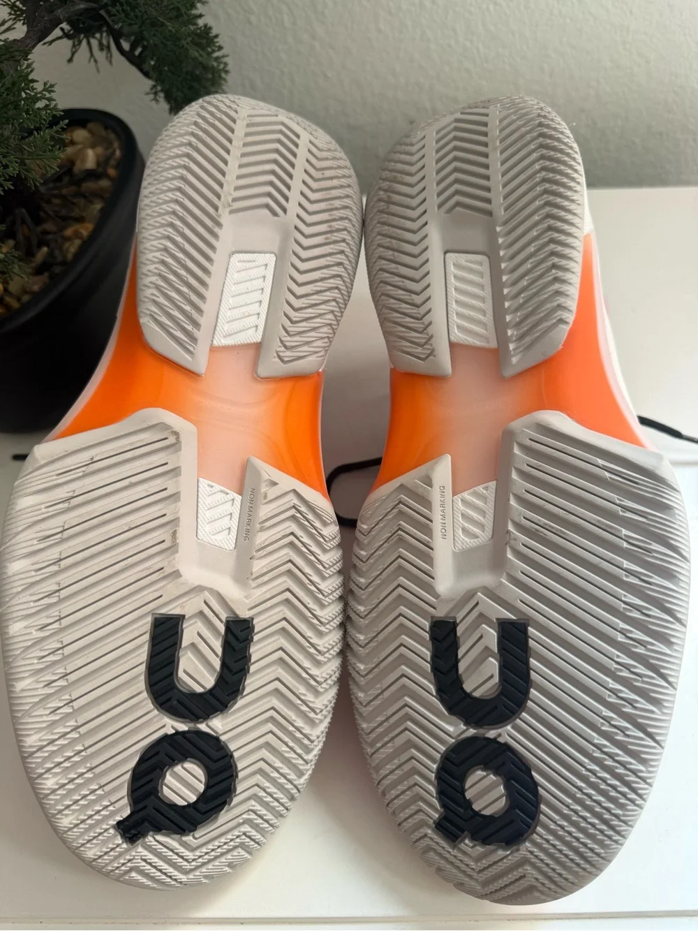 On the Roger pro fire men size 9  or women size 10 pink and Orange Men's Athleti